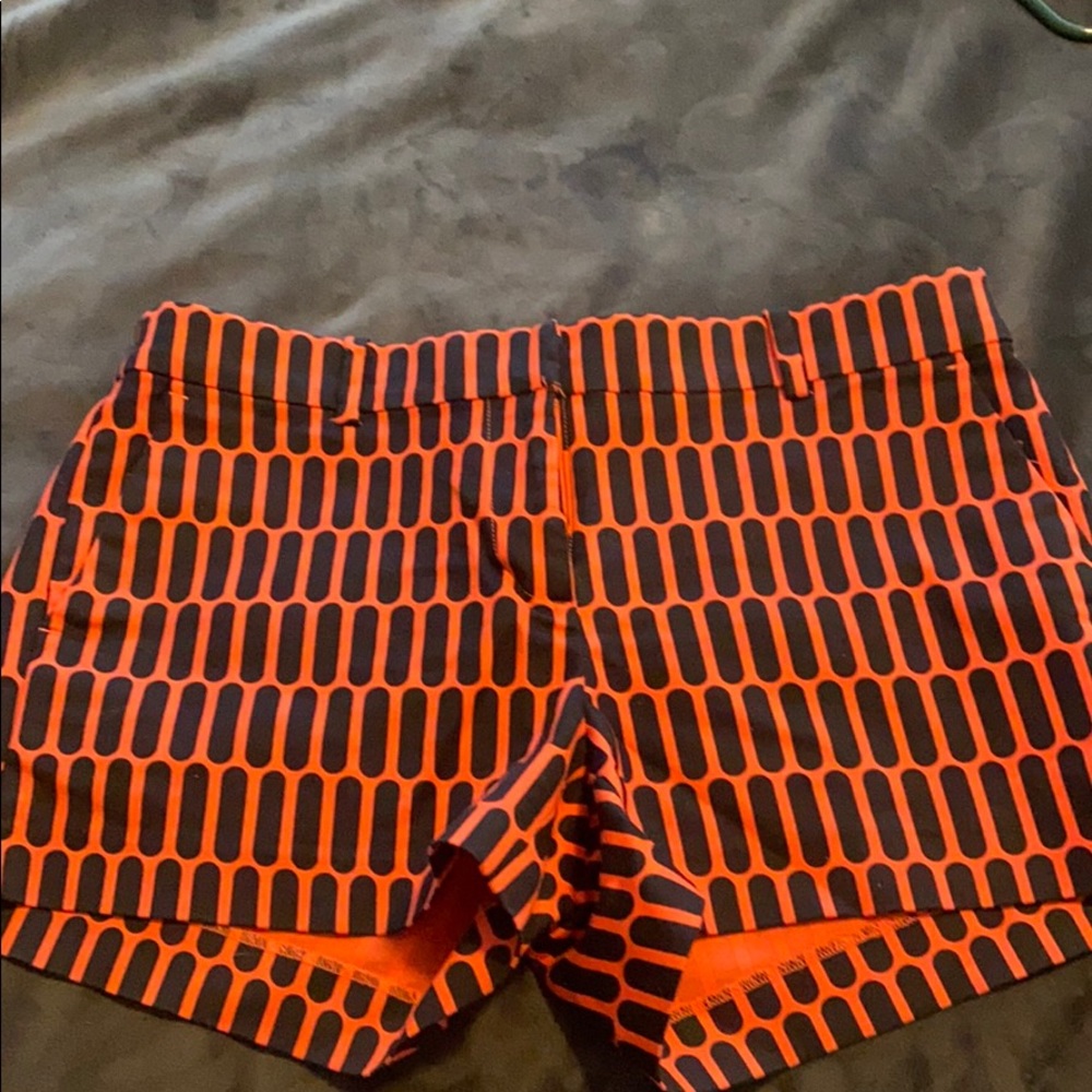 Michael Kors- size 4. Orange and black shorts
